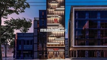 Tòa nhà ngay vòng xoay Dân Chủ - DT 500m2 có thang máy trống suốt 