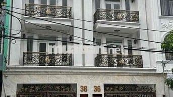 CHO THUÊ NHÀ LIỀN KỀ GẦN 800 M2 SÀN ĐỐI DIỆN AEON MALL BT CÓ THANG MAY