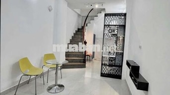 nhà mới kèn 2 lầu st 2pn 3vs hồ hảo hớn