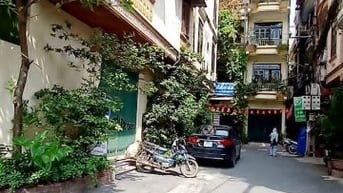 Nhà Sát ĐH Kinh Tế-Phố Trần Đại Nghĩa-ÔTÔ Đỗ Cửa-DT68m2 x 4Tầng-15Tỷ2