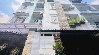Phan Xích Long - hẻm oto 2 mặt tiền 5 phòng 4 tầng 22tr/th