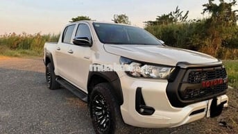 Toyota Hilux 2021 Tự động Trắng 97.000 km