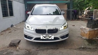 BMW 218i 2015 Trắng 5 chỗ