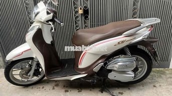 Honda SH Mode Trắng Xăng