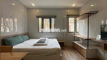 nhà 5 lầu 8 phòng ngủ và 1 mb ngay mặt tiền Huỳnh văn bánh