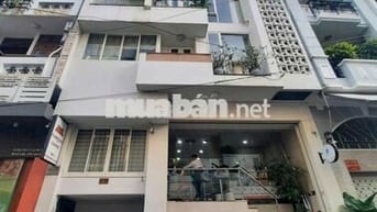 TÒA NHÀ ĐƯỜNG PHỔ QUANG. DT: 7X20M. HẦM - TRỆT - 4 TẦNG