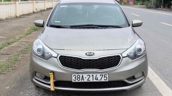 Kia K3 2015 Số sàn Vàng cát 5 chỗ