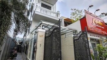 nhà mới xây 2 mặt tiền 107 Lý Chiêu Hoàng 4x28 5 tầng