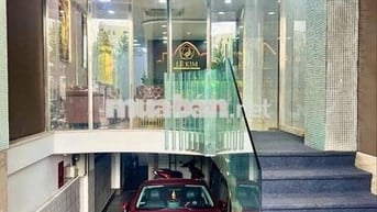 Cần cho thuê nhà mặt tiền Trần Hưng Đạo Quận 1 - Hầm 6 lầu