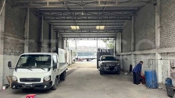 Kho xưởng bãi 475 m² có sẵn cầu nâng xe,mặt tiền đường Trương Văn Diễn