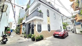 Cần Bán nhà 26/33 Thích Quảng Đức nối dài đường Số7 hẻm xe hơi nhà mới