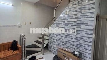 NHÀ 2 MẶT TIỀN HẺM NGAY TRUNG TÂM Q4