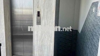 Khối nhà 1 trệt 2 lầu + sân thượng 1100m2