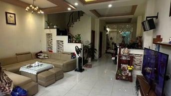 Nhà 4 tầng, thang máy, mặt đường Tân Thuận Nam. 5*20 giá 15,5 tỷ.