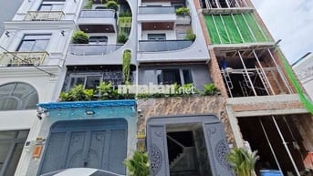 Nhà gần chợ An Sương đường DCT 15, DT 4m x13m, 3 lầu,  có gara xe hơi
