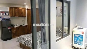Cho thuê studio trệt ban công thang máy giặt full nt Trần Hưng Đạo Q1