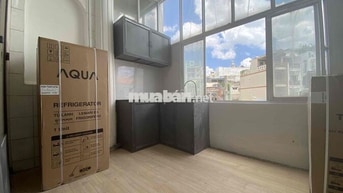 cho thuê căn hộ 1 phòng tách bếp bancol mặt tiền đường, máy giặt riêng