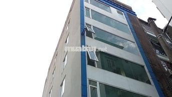 Toà nhà phố Nguyễn Khang 70m x7tầng, lô góc, thông suốt, mới, đường 7m