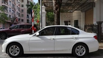 Bán xe BMW 320i màu trắng, chính chủ, đăng ký cuối 2016