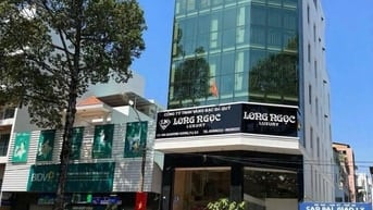 Nhà góc 2 MT An Dương Vương Q.5, 9x20m, hầm lửng 5L, thang máy có PCCC