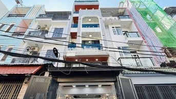 Nhà Trệt Lửng 4 Lầu 5PN 7WC . CÓ Tahng Máy 450ky Hẻm 8m 1 trục