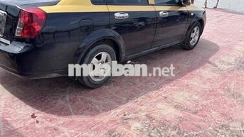 Chevrolet Lacetti Đen, vàng 5 chỗ