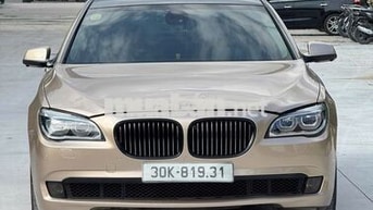 BMW 750Li xDrive F02 2009 Vàng cát Mỹ