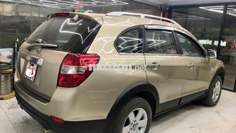 Chevrolet Captiva 2007 Vàng 7 chỗ