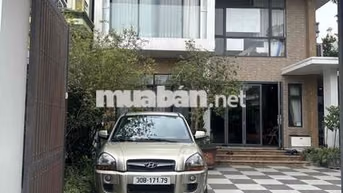 Hyundai Tucson 2.0 hai cầu 2009 Vàng cát