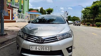 Toyota Corolla Altis 1.8G 2015 Bạc 140.000km