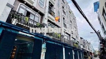 cho thuê nhà Nguyễn Tư giãn p12(4x13) lửng , 3 lầu , 5pn , 6wc full