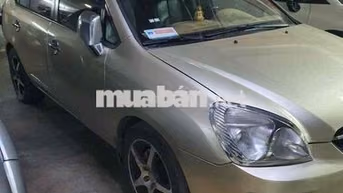 KIA Caren 2010 Vàng cát
