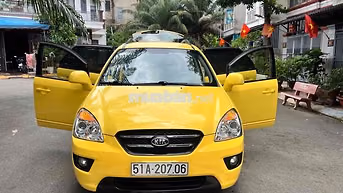 Kia Carens 1.6 Xăng Số sàn 7 chỗ Vàng Ánh Kim