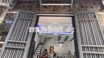nhà ngay khu vực chợ Lê văn quới  dt 4×8.5 Nhà 2،lầu  Hẻm ô tô sổ riên