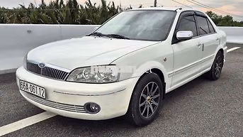Ford Laser 1.8 MT Trắng Số sàn
