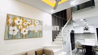 Nhà mặt tiền 2tầng - sân đỗ ô tô trong nhà - cổng tự động 