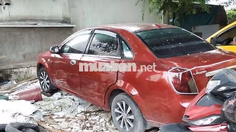 Lacetti 2004 đỏ xe gia đình không chạy cần bán.