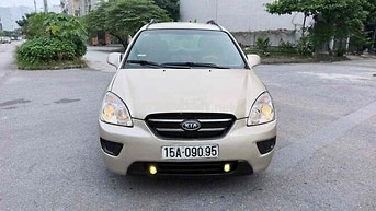 Kia Caren 2009 Số sàn Vàng cát