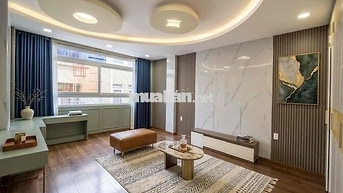 Cho thuê nhà 10PN có thang máy đường Phạm Văn Đồng, p13, BT. Giá 40tr
