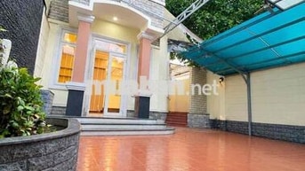 Cho Thuê Biệt Thự DT 8x16 1Trệt 1Lầu 4Pn 3Wc Sân Ôtô Hẻm Xe Tải