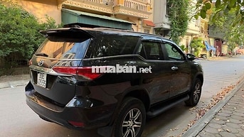 Toyota Fortuner 7 chỗ Đen Tự động Xăng 90000 km