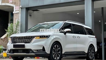 Kia Carnival 2.2D Signature 2024 trắng đi lướt