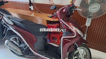 Honda Vision màu đỏ mận