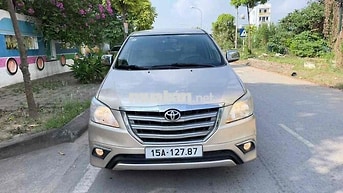 Toyota Innova 2014 E 7 chỗ Vàng cát